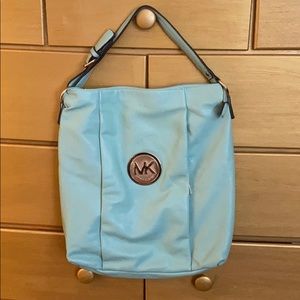 Michael Kors teal hobo tag with shoulder strap